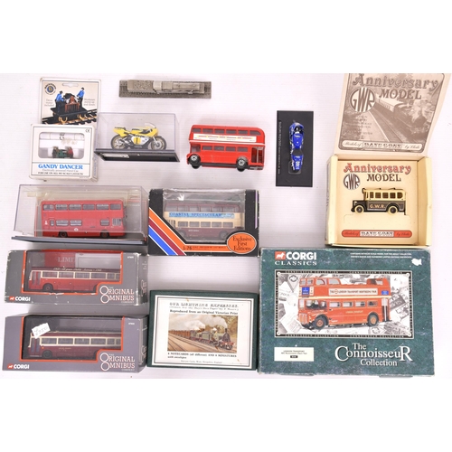 131 - Quantity of model buses and other vehicles, paperweights and other items.