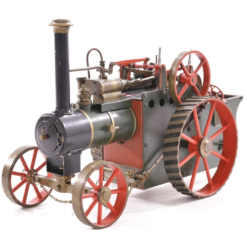 154 - Traction engine, live steam operated via oil burner and reservoir. Levers for lock, cut off, fwd/rev... 