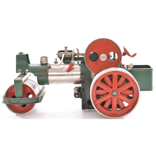 154 - Traction engine, live steam operated via oil burner and reservoir. Levers for lock, cut off, fwd/rev... 