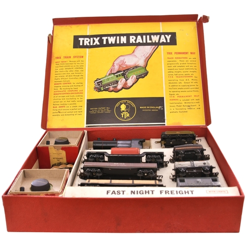 405 - '00' gauge Trix Twin Railways 3 rail electric set 'Fast Night Freight'. Black 4-4-0 loco + tender, 6... 