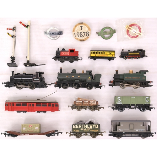 415 - A variety of Triang locos, rolling stock and track, EFE tube set (axle absent) and several badges.