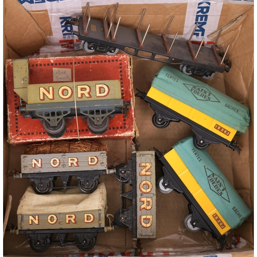 74 - Hornby '0' gauge wagons, four Hornby Series Nord wagons, one boxed with vigie plus three post-war 'T... 