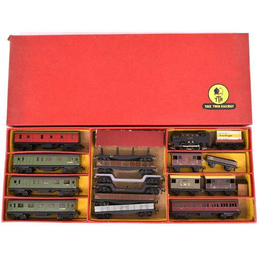 89 - Trix Twin Railway 3-rail electric set. Box contains black 0-4-0 loco No 298 + 5 Shorty coaches + 6 b... 