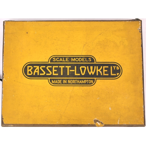 95 - Bassett-Lowke '0' gauge, post-war set box containing two carmine and cream coaches only. Very good.