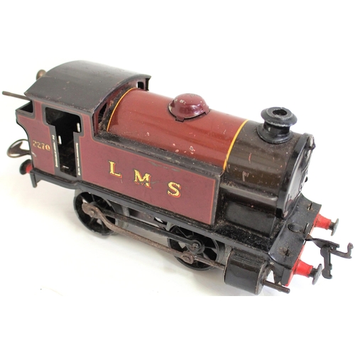 869 - '0' gauge Hornby and Bing. Hornby clockwork 101 0-4-0T loco LMS No 2270. Five Bing open wagons and B... 