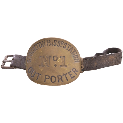 105 - A North Eastern Railway armband, STOCKTON PASSR STATION, OUT PORTER No 1, engraved brass, 4½