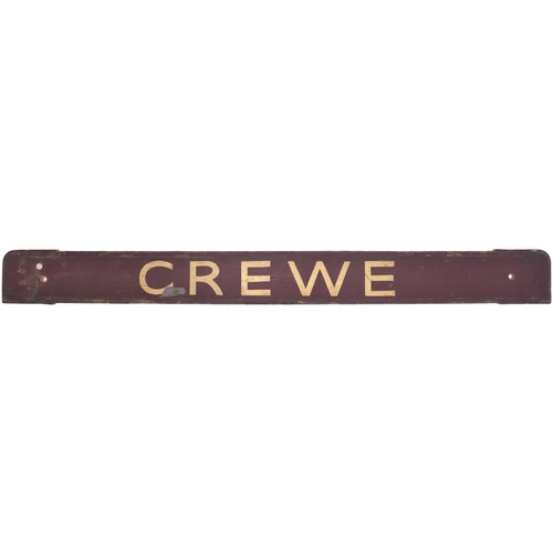 142 - A small carriage board, WHITCHURCH-CREWE, used on local services. Painted wood, length 32