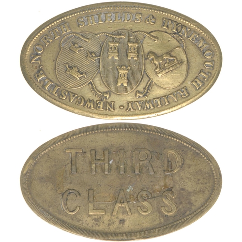 166 - A metal ticket, NEWCASTLE, NORTH SHIELDS & TYNEMOUTH RAILWAY, THIRD CLASS, with coat of arms, brass,... 