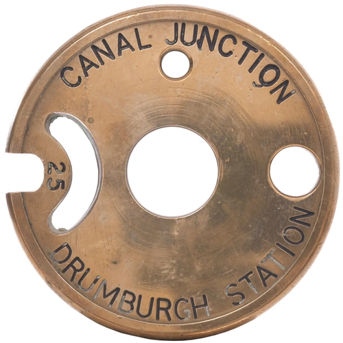 313 - A Tyers No 6 single line tablet, CANAL JUNCTION-DRUMBURGH STATION, (brass), from the North British R... 