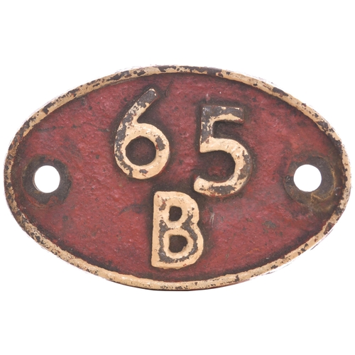 348 - A shedplate, 65B, St Rollox (1948-November 1966), in ex loco condition with red paintwork. (Postage ... 