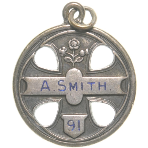 95 - An LNWR directors pass, A. SMITH, 91, featuring the Britannia motif and floral decoration, silver, 1... 