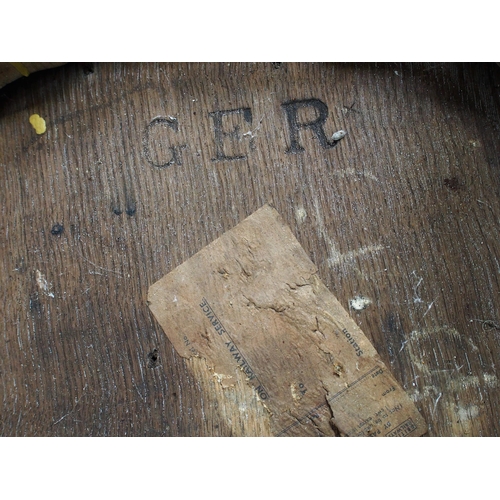 204 - Great Eastern Railway wooden office chair, branded GER on underside, wooden scooped out seat, good s... 