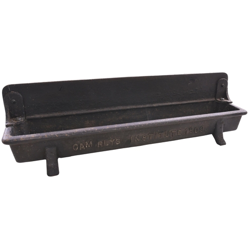 414 - A Cambrian Railways drinking trough, the front marked CAM RLYS INSTITUTE 1909. Cast iron, length 28½... 