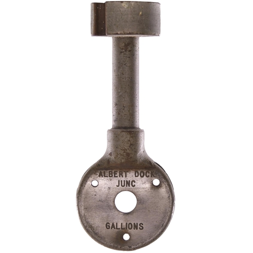 464 - A single line key token, ALBERT DOCK JUNC-GALLIONS, (chromed steel), from the Royal Albert Dock Comp... 