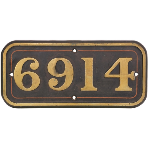 A GWR brass cabside numberplate, 6914, from a GWR 4900 Hall Class 4-6-0 built at Swindon in February 1941 and named LANGTON HALL after the Grade II country House near Malton in North Yorkshire, recently renovated by a Mr William Langton. It spent most of its BR days at St Philips Marsh, Westbury and Taunton, finishing its days at Cardiff East Dock from where it was withdrawn in April 1964 and sold for scrap to Birds at Risca. Cast brass, ex loco condition. (Dispatch by Mailboxes/Collect from Banbury Depot)