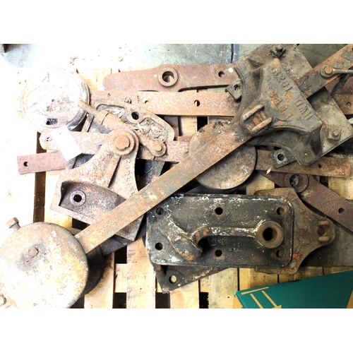 107 - Quantity of signal balance weight arms, balance weights and balance weight post castings, a good sel... 