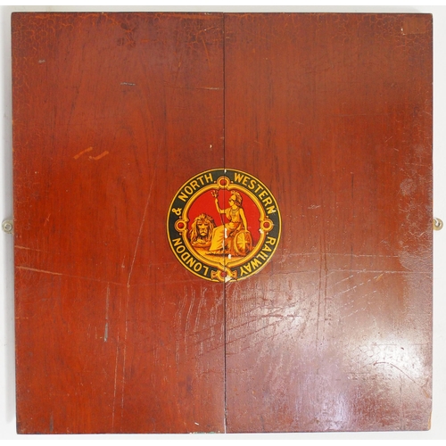 43 - LNWR garter coat of arms mounted on a substantial mahogany board with steel straps to rear, 24