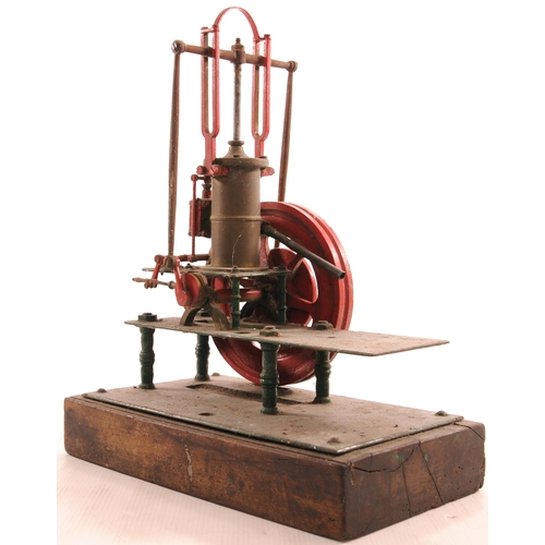 455 - Victorian stationary engine, on wooden plinth, requires cleaning, includes a card giving details of ... 