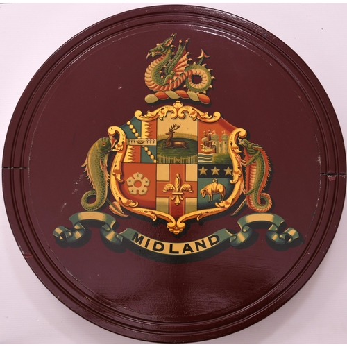 459 - Midland Railway coat of arms mounted on a substantial circular maroon board with frame 21½