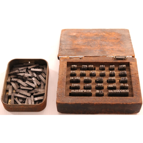 594 - Date press type box from Abergavenny Junction, lid detached, also a tin of extra type.