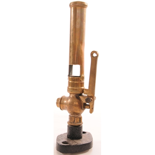 728 - Organ pipe whistle on base, with valve and lever, cast brass, cast iron base with feed beneath, heig... 