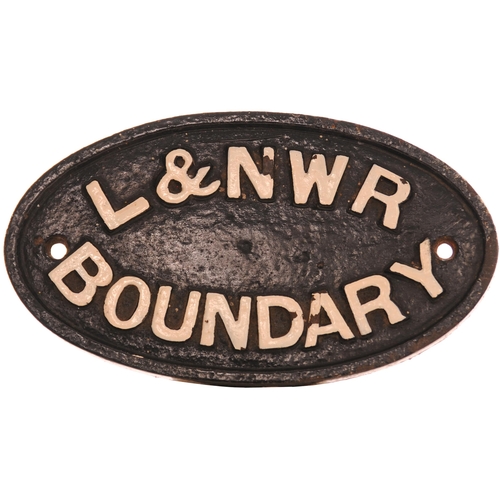 1071 - LNWR boundary post, small oval cast iron, 9