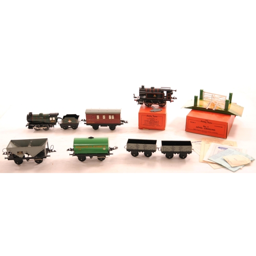 962 - Hornby 0 Gauge, clockwork locos x2, level crossing, track, etc, Farish HST, box poor, and other item... 