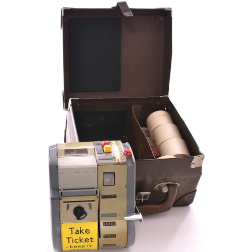 963 - Almex bus ticket machine and case, with spare ticket rolls and hand-held rack with LT bus tickets.