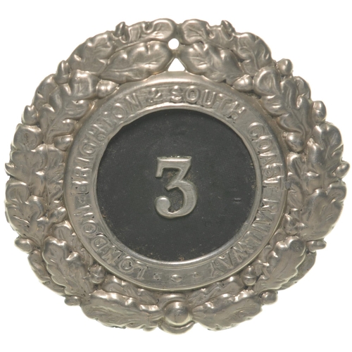 113 - An LB&SCR cap badge, 3, with decorative border, 2 3/8