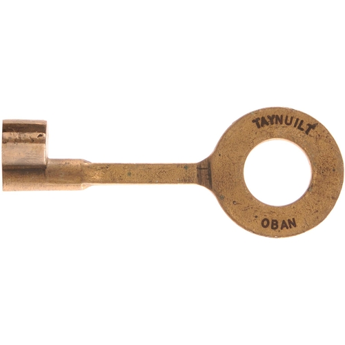 137 - A single line key token, TAYNUILT-OBAN, (brass), the final section of the Callander and Oban route. ... 