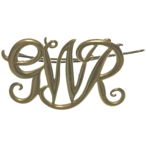 146 - A GWR cap badge, an early style brass monogram, approx. 2½