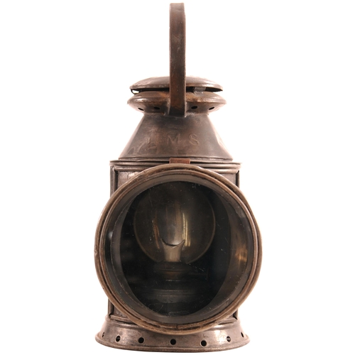 440 - An LNWR three aspect handlamp, the side stamped WOLVERTON CARR DEP, HEATING APPARATUS, LNWR, the top... 