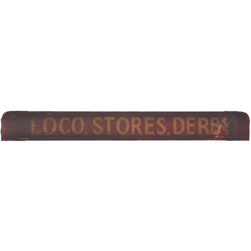 A small carriage or van board, LOCO STORES DERBY, painted wood, steel strips at the ends, length 28", original condition. (Postage Band: C)