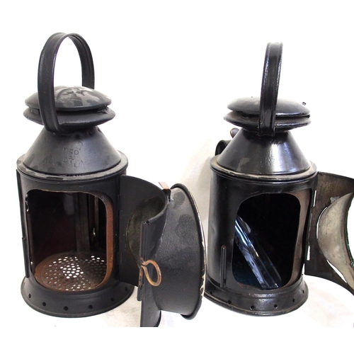 121 - London North Western Railway 3 aspect handlamps - one with no reservoir otherwise complete case stam... 