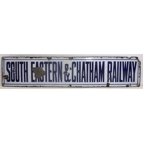 1041 - South Eastern & Chatham Railway enamel poster board header, 27