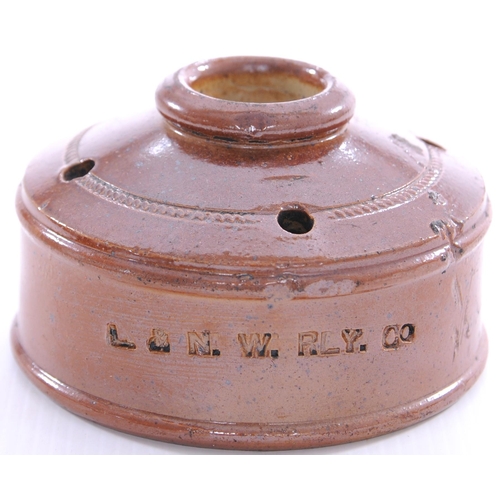 1094 - LNWR landmine inkwell, two base chips, also a clothes brush, LNWR initials inlaid on top and stamped... 