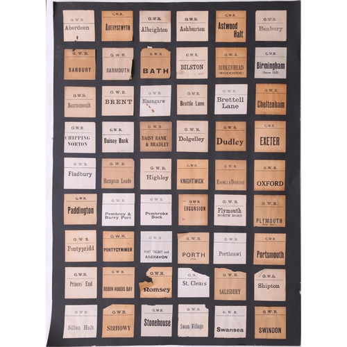 1097 - Mounted luggage labels, a frame containing 27 LSWR labels, three black sheets of GWR labels laid dow... 