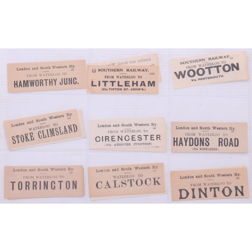 1097 - Mounted luggage labels, a frame containing 27 LSWR labels, three black sheets of GWR labels laid dow... 