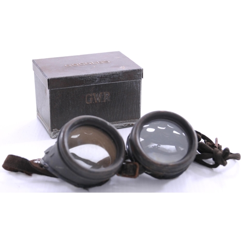 1107 - GWR engine driver's goggles, contained in their original tin embossed GWR on the side and GOGGLES on... 