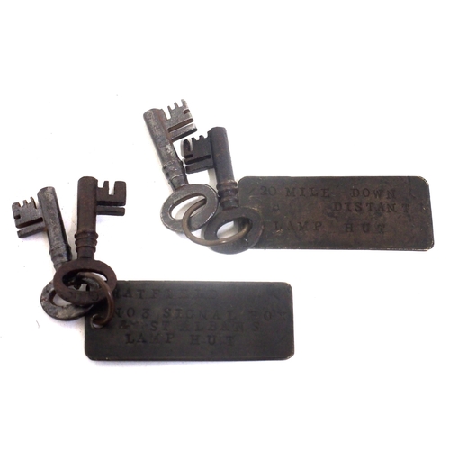 932 - Great Northern Railway keys on aged brass key tags stamped 