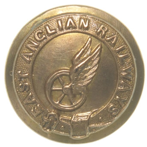 118 - An East Anglian Railways uniform button, featuring a winged wheel and belted garter, brass, ¾