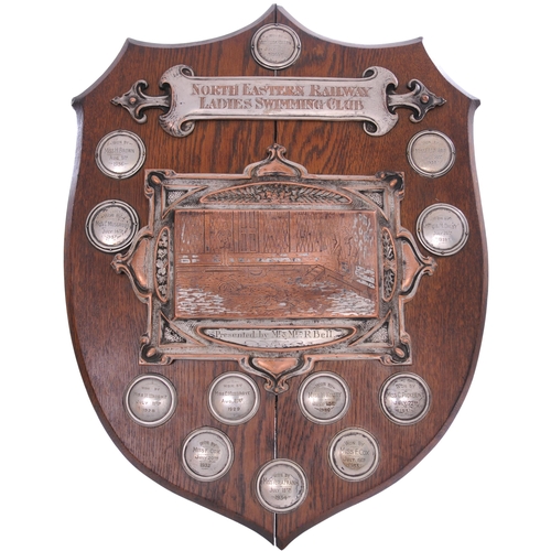 255 - A North Eastern Railway competition shield for the NER Ladies Swimming Club, featuring a decorative ... 