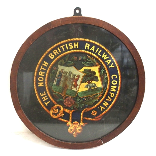 194 - North British Railway garter crest in circular framed & glazed mount, 18