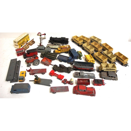 387 - Quantity of model Dinky cars & lorries, lead figures badges etc. (Dispatch by Mailboxes/Collect from... 