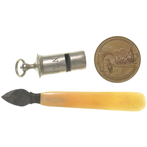 645 - NER letter opener and whistle, each marked NER, and an L&MR 150 medal. (3)