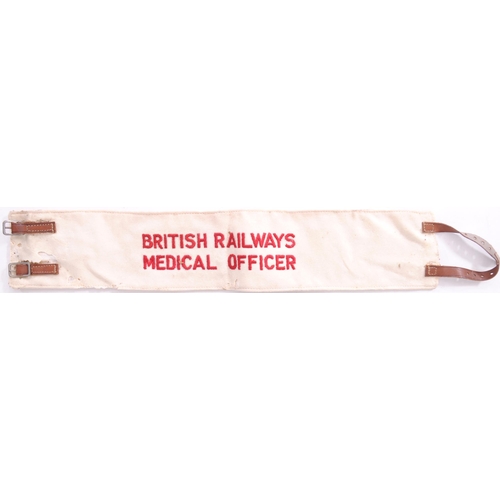 654 - Armband, BRITISH RAILWAYS, MEDICAL OFFICER, cloth, leather straps and buckles, length 15