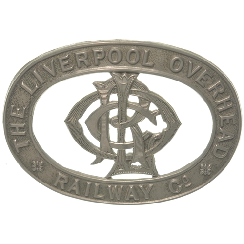 677 - Cap badge, THE LIVERPOOL OVERHEAD RAILWAY Co, nickel garter surrounding company monogram, 2¾