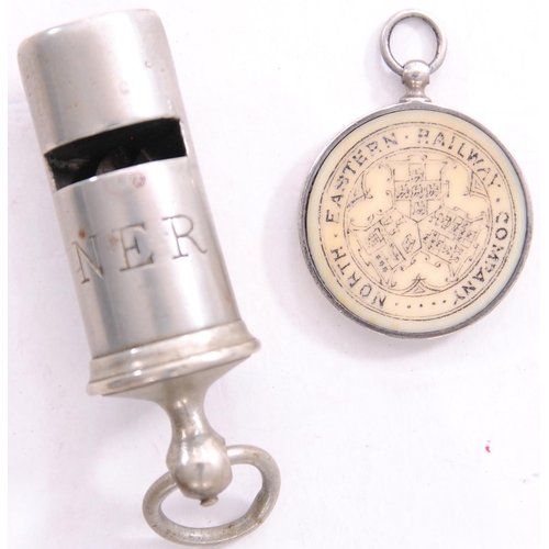 699 - NER barrel type whistle and a directors pass, bone, featuring coat of arms, MR R GARDINER, in silver... 