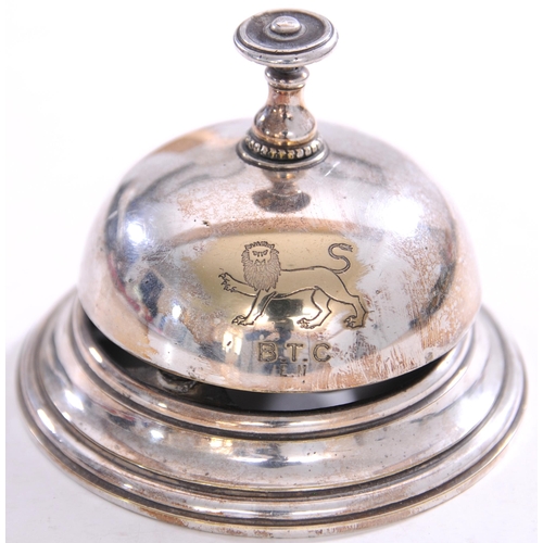 837 - Reception desk bell, the side engraved B.T.C, with lion motif, silver plate, base diameter 4