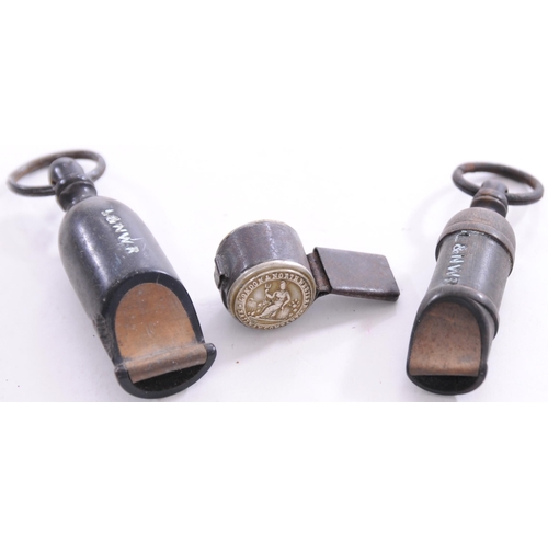 857 - Guard's whistles, LNWR wooden, large and small, also small button whistle. (3)